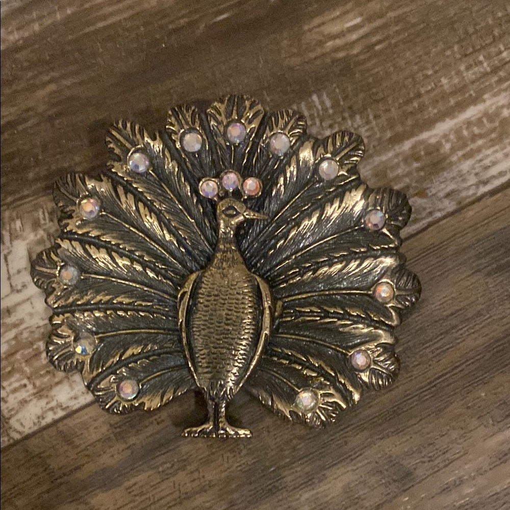 Peacock belt buckle